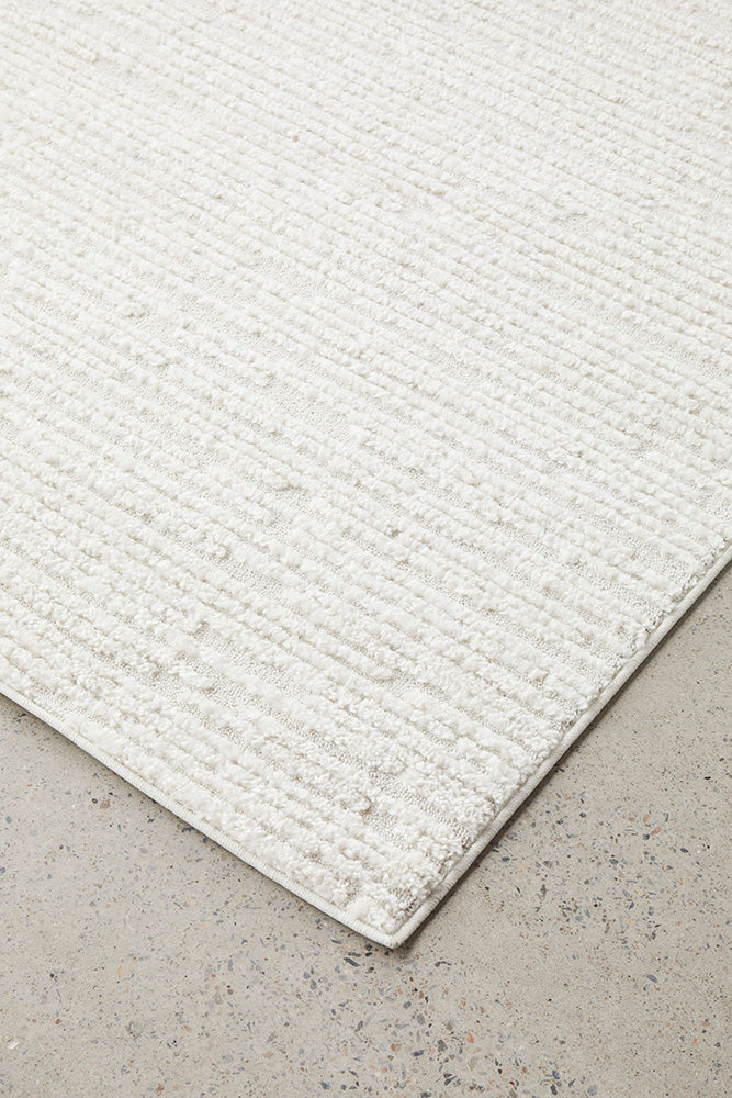 Exclusive Marigold Suri White Power Loomed Polypropylene Rug for a Cozy Living Space