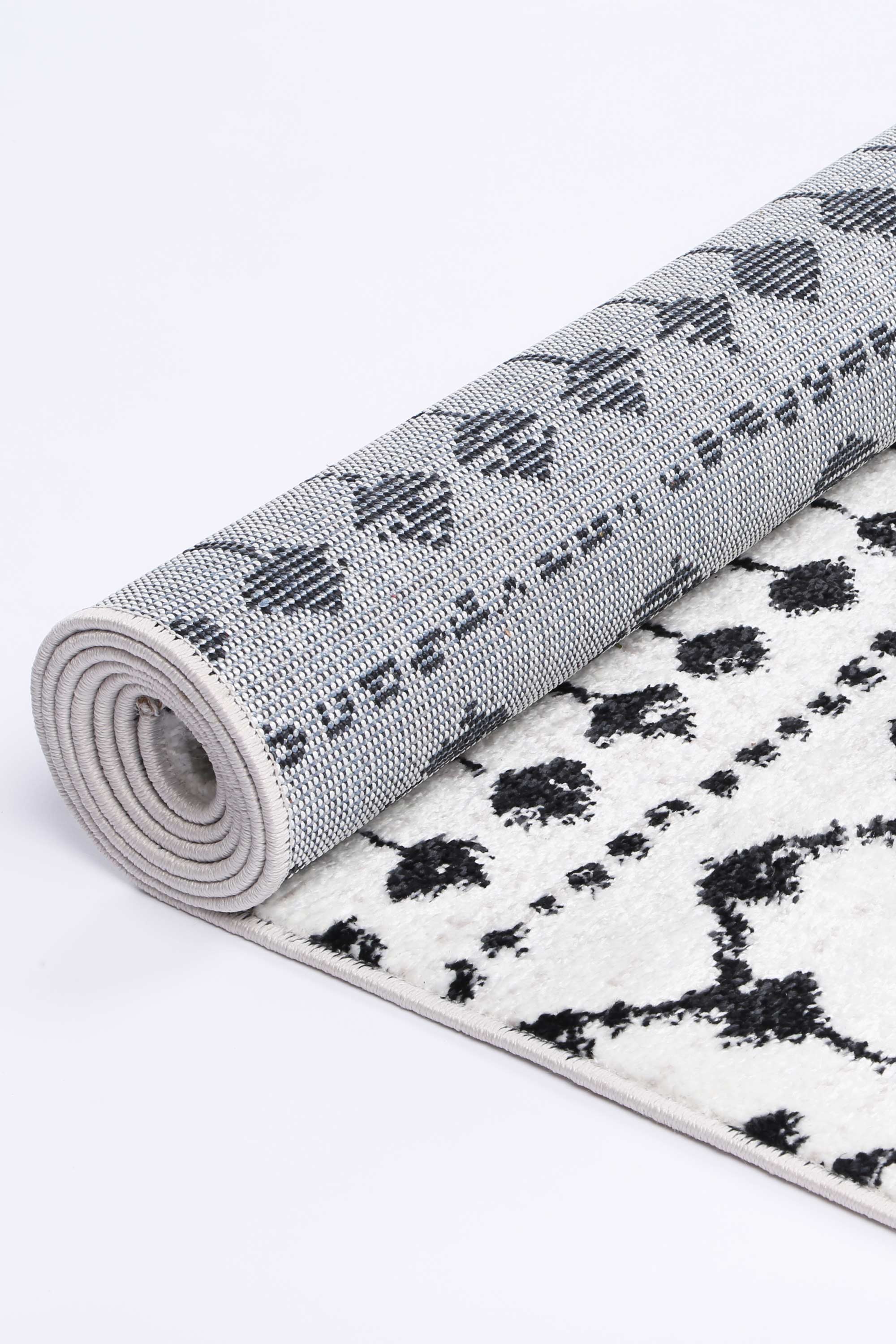 Stylish Ermina Tribal Black and White Polypropylene Rug for Modern Décor