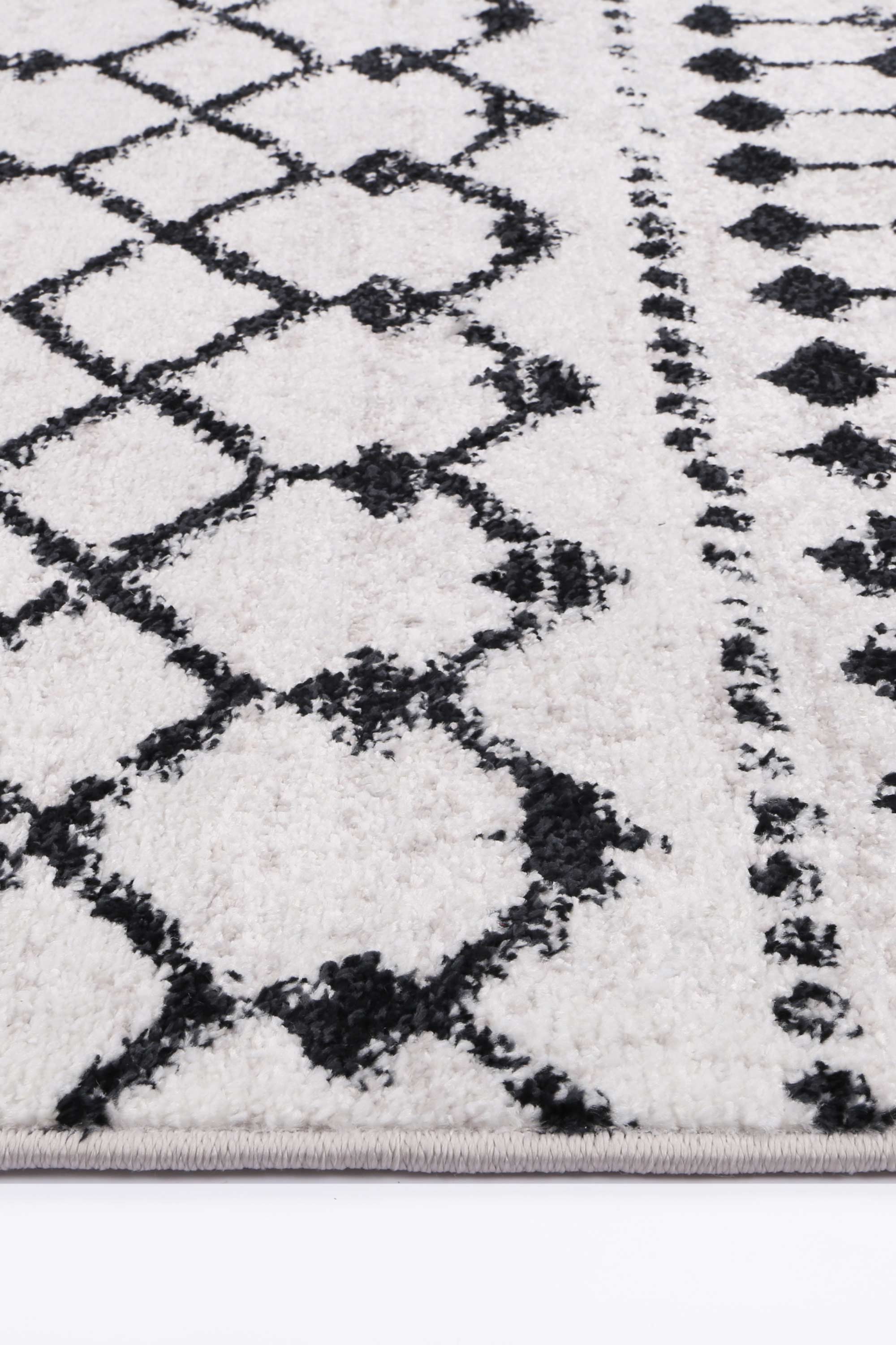 Stylish Ermina Tribal Black and White Polypropylene Rug for Modern Décor