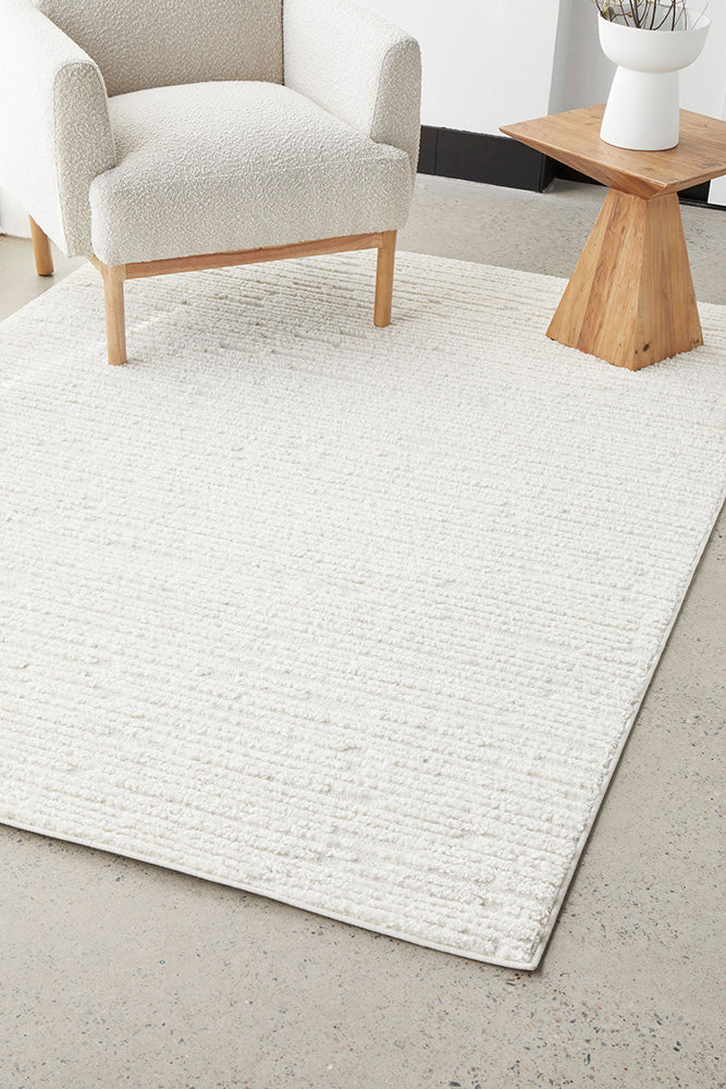 Exclusive Marigold Suri White Power Loomed Polypropylene Rug for a Cozy Living Space