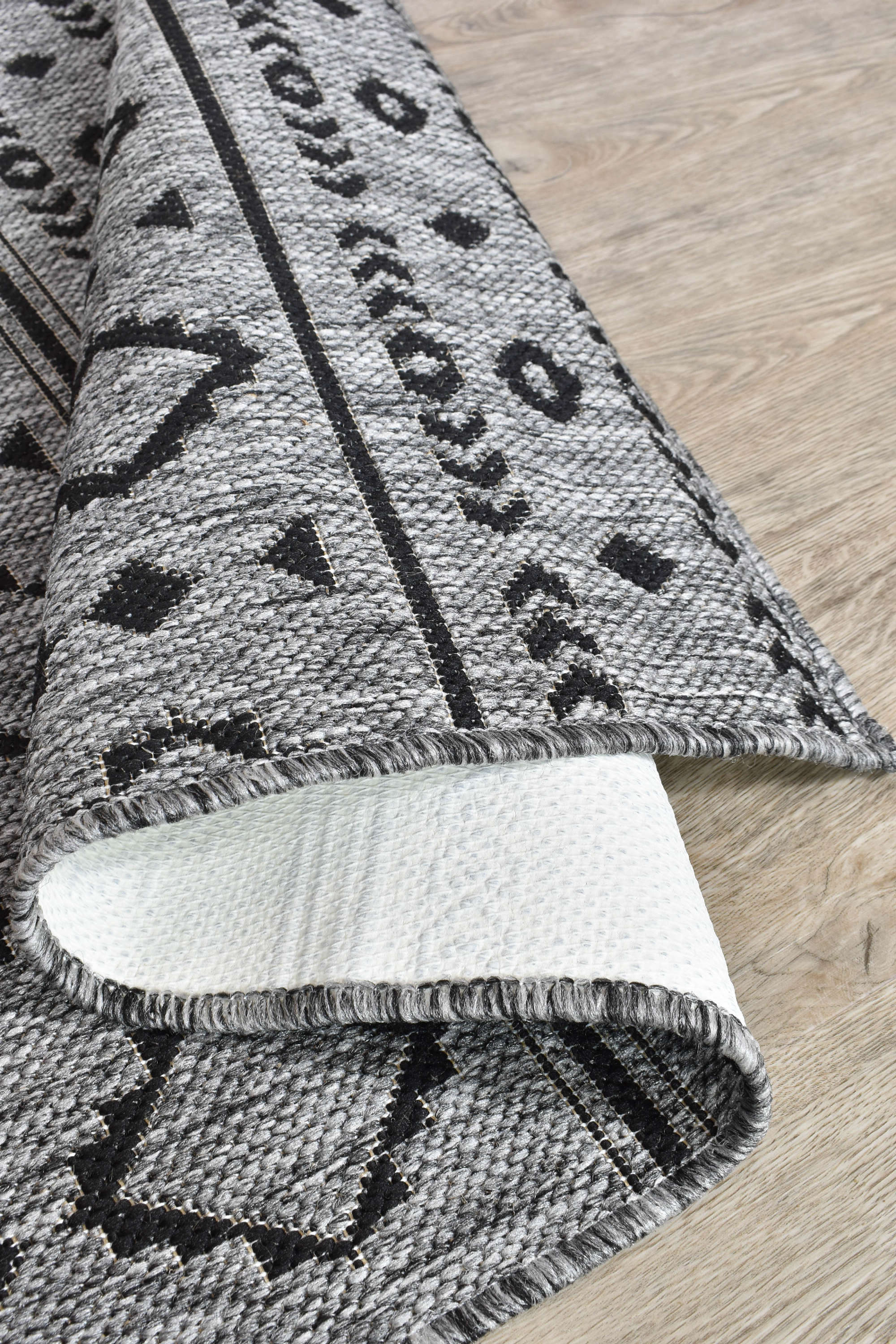 Affordable Alaska Runner Rug in Dark Grey for Indoor & Outdoor Use