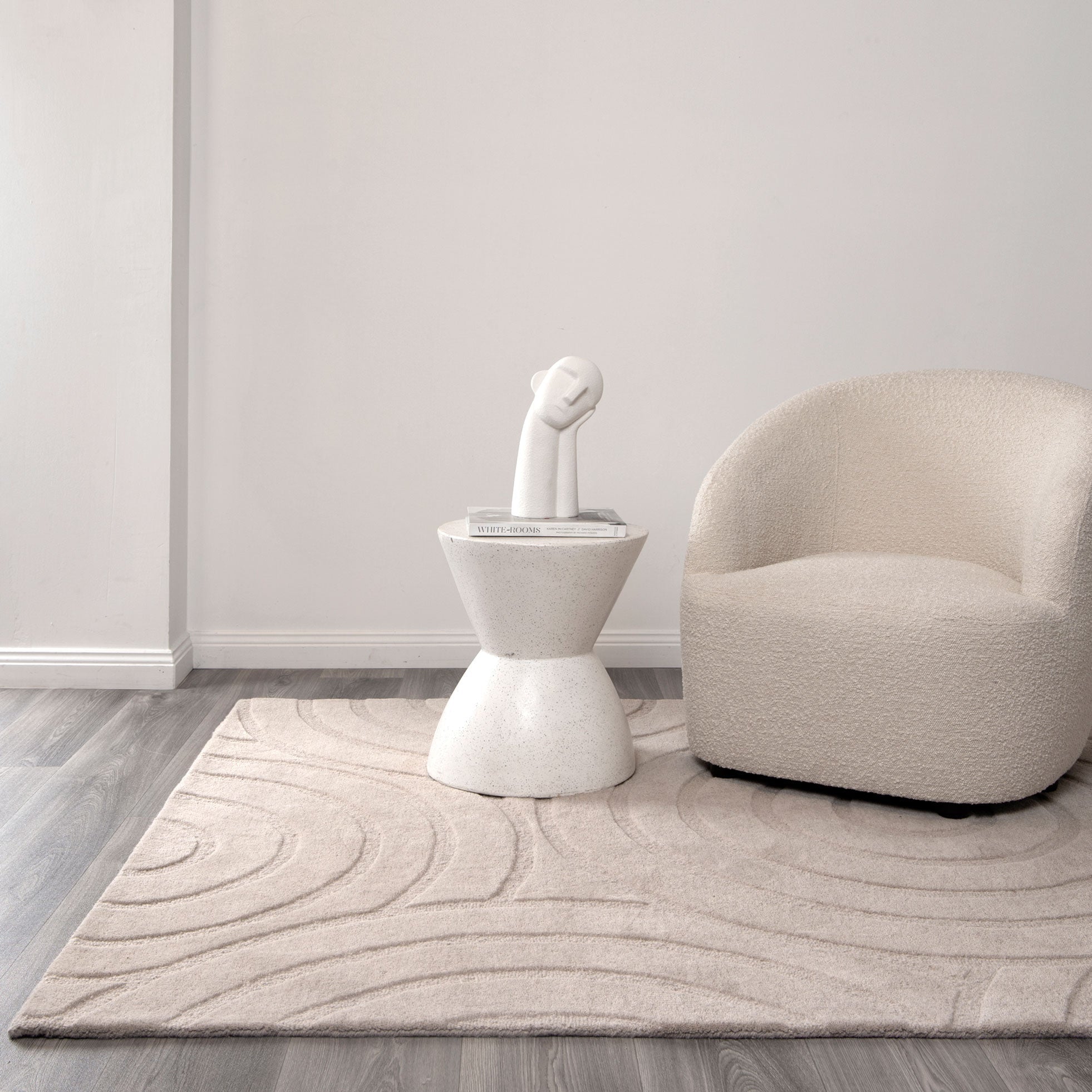 Get This Luxurious Les Nomades Beige Ellipse Hand - Tufted Wool Rug for Your Modern Space
