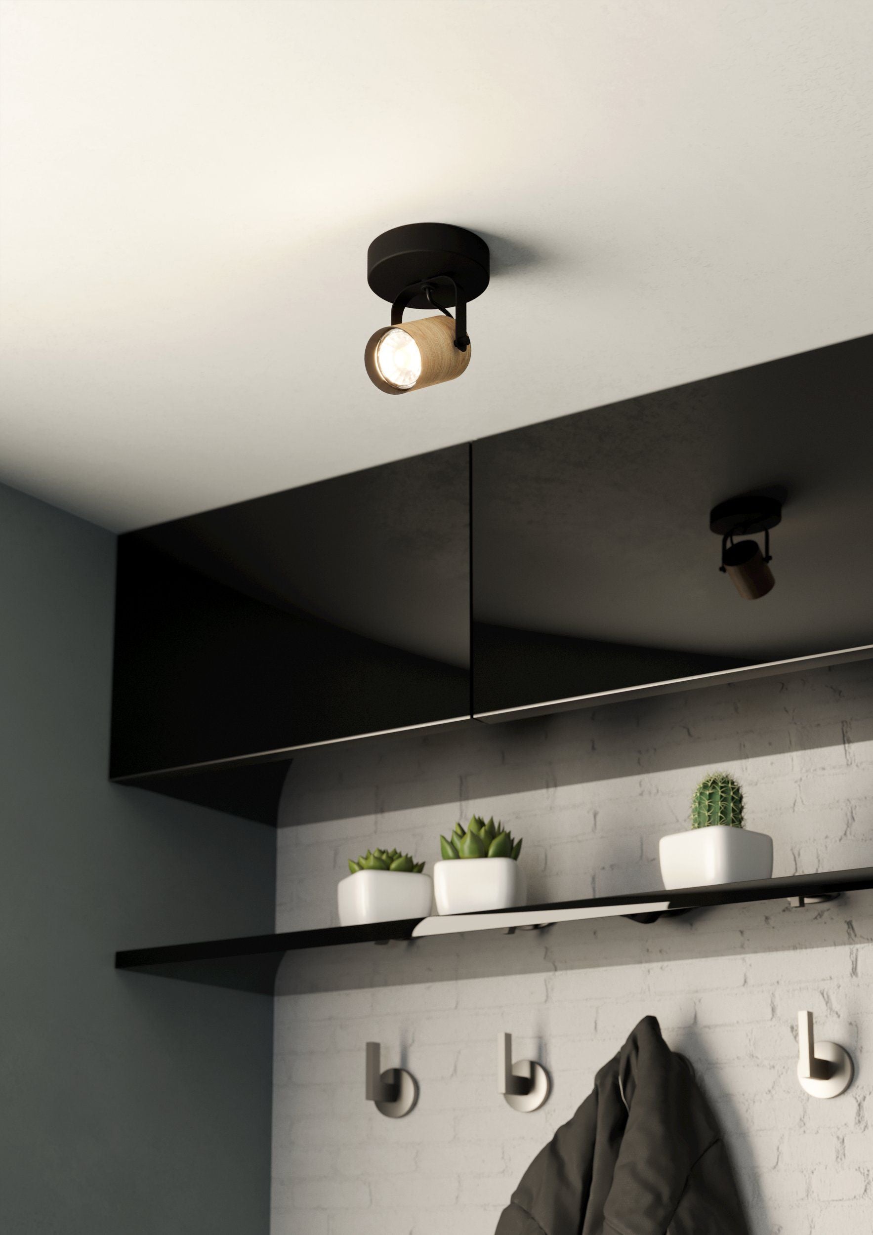 Stylish Steel Black CAYUCA Spot with Warm Lighting